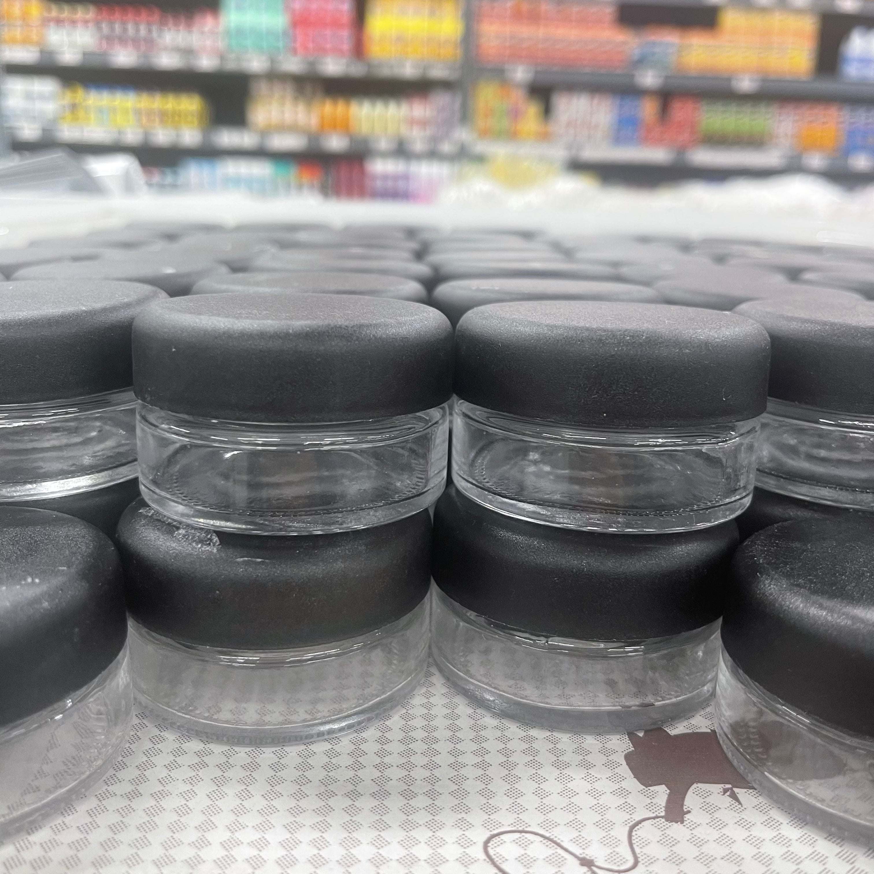 1oz Matte Black Round Cap Clear Child Resistant Glass Jar